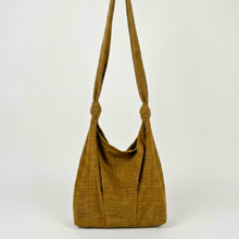 Handmade yellow cotton crossbody shoulder bag with knotted straps and relaxed boho silhouette