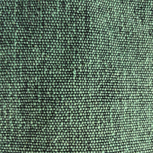 Detailed close-up of ivy green woven cotton fabric texture used in handmade tote bags