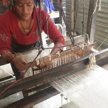 Artisan weaving vegan banana yarn scarf at Deepchand workshop in Nepal